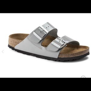 Like new Birkenstock size 7 womens with the grey patent leather strap